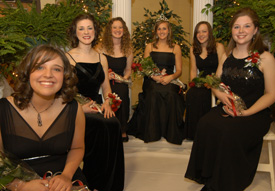 The 2006 Union homecoming court, from left: freshman Kelly Northam, junior Lindsey Abell, senior Kathleen Lokey, senior Kari Bachman, senior Brooke Fowler and senior Annie Ross. Not pictured is sophomore Candace Cross. (Photo by Morris Abernathy)