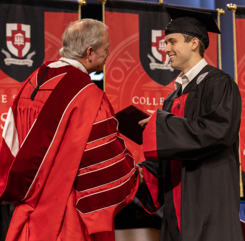 Moore urges Union graduates to choose the ‘hard path’