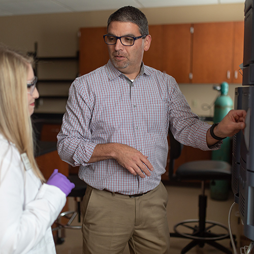 Pharmacy professor Blake Watkins has secured the university's first patents. Union President Samuel W. "Dub" Oliver reported to trustees on Watkins' research and other success stories from Union's "United in Spirit. Grounded in Truth." strategic plan. (Photo by Kristi Woody)