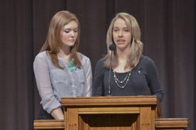 Union students Hope Lewis (left) and Tori Brooks read Scripture during the campus prayer service held Feb. 14 in memory of Union student Olivia Greenlee. (Photo by Morris Abernathy)