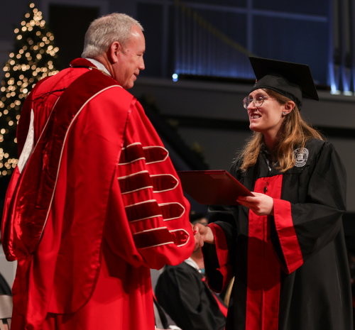 Union President Samuel W. "Dub" Oliver presents Abby Lappe with her degree at commencement exercises Dec. 16 at West Jackson Baptist Church. (Photo by Karley Hathcock)