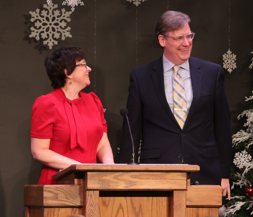 Ashley and Chris Blair speak at a Dec. 1 dinner held by Union trustees to honor university employees with more than 20 years of service. (Photo by Blake Barnes)