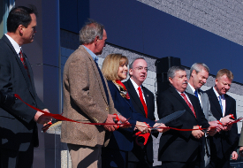 Preparing to cut the ribbon at the dedication of Union's new Center for Continuing and Professional Studies building are (from left) Gary Carter, Jerry Gist, Beverly Absher, David S. Dockery, Frank Wagster, Mike Gardner and Rod Parker. (Photo by Beth Spain)