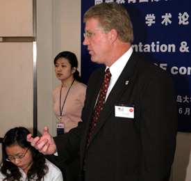 Tim Smith, dean of Union's School of Nursing, leads a session as part of a conference at China's Qingdao University. (Photo by Ben Dockery)