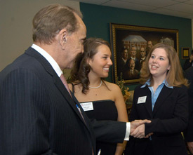 Bob Dole visits with Union students Katie Daniel (center) and Annie Ross (right) prior to the Scholarship Banquet. (Photo by Morris Abernathy)