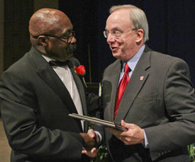 Harrell Carter (left), president of the Jackson-Madison County branch of the NAACP, presents Union University President David S. Dockery with the William D. Smart Jr. Race Relations Award. (Photo by Michelle Gachet/The Jackson Sun)
