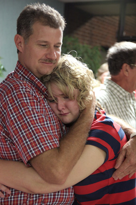Freshman Cassie Lutrell says goodbye to her father, Chris, after the worship service on campus Aug. 26. (Photo by Kyle Kurlick)