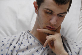 Kevin Furniss is one of the remaining students still in the hospital after a tornado hit dormitories on the campus. (Photo by Justin Veneman)