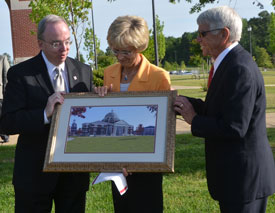 Union University President David S. Dockery presents a framed rendering of the new Union library to Bill and Carol Latimer as part of the April 12 groundbreaking ceremony. The Bill and Carol Latimer Foundation provided a $10 million lead gift for the new library project. (Photo by Morris Abernathy)