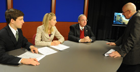Broadcasting professor Steve Beverly (right) gives last-minute instructions to Matthew Kuchem (left) and Juliana Robbins, who served as anchors for the premiere of "Jackson 24/7." Union President David S. Dockery was the first guest on the news program. (Photo by Morris Abernathy)