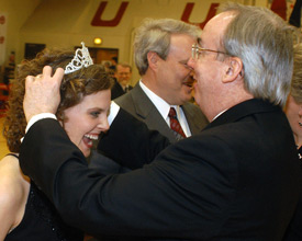 Union University president David S. Dockery crowns senior Lauren Oldham as 2005 Homecoming queen during halftime of the women's basketball game Feb. 19. (Photo by Morris Abernathy)