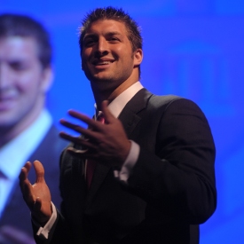 Tim Tebow speaks at the Roy L. White Legacy Golf and Gala April 19. (Photo by Morris Abernathy)