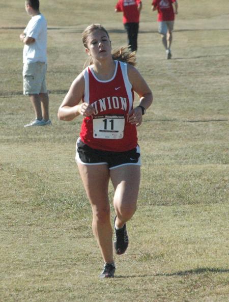 Danielle Partain competes in the Union University Cross Country Invitational. - Photo by Tommy Sadler