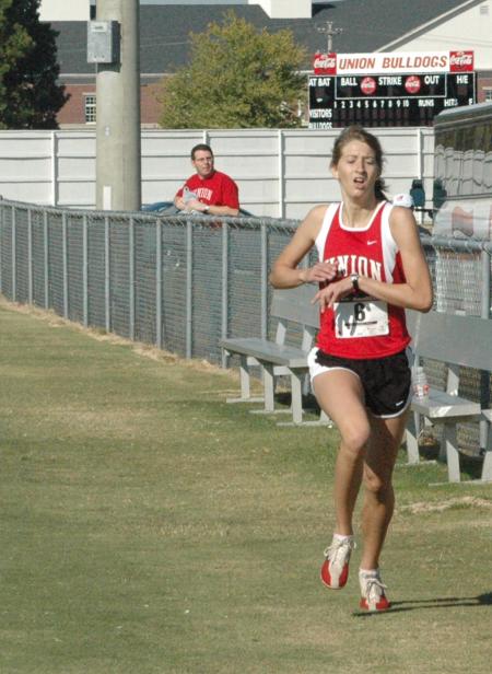 Lydia Bond led the Union team and finished third overall in the Union University Cross Country Invitational as she helped the Lady Bulldogs take first place. - Photo by Tommy Sadler