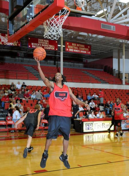 Tacuma Alexander lays up a shot during warm ups before Bulldog Madness. - Photo by Morris Abernathy