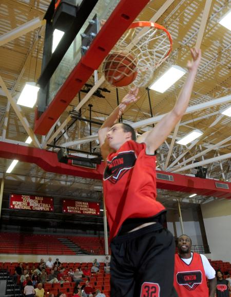 Veljko Petrovic follows through on a dunk during Bulldog Madness. - Photo by Morris Abernathy
