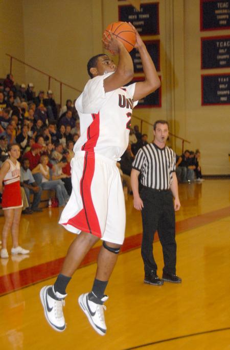 Junior forward Brian Lake shoots a three-pointer in a game versus Bethel (Tenn.) College. - Photo by Morris Abernathy