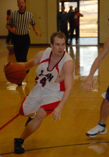 Bulldog guard Matt Neaville drives to the basket. - Photo by Morris Abernathy