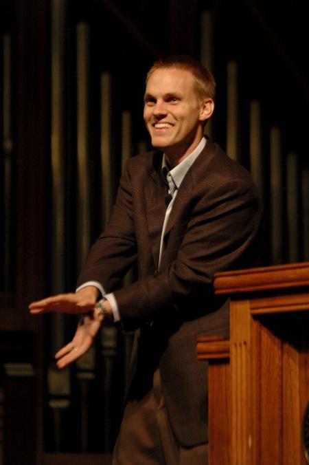 David Platt encourages students to be a stronger community of faith that depends on Christ during a recent chapel service.  Here he parallels the experience of birthing his son to Peyton Manning. - Photo by Beth Spain
