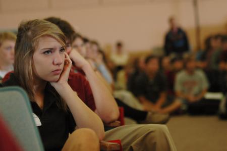 A prospective student from Evangelical Christian School listens intently to David Platt during a recent chapel. Students from Union filled the seats and isle space just to hear him.   - Photo by Beth Spain