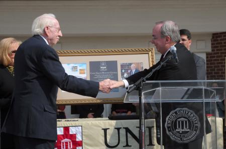 President Dockery presents the Grants with a plaque commemorating the dedication of the Carl Grant Events Center. - Photo by Morris Abernathy