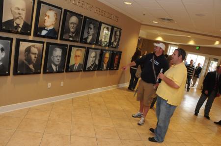 Members of the Union Community take a look at the past presidents of Union University in the Grant Center. - Photo by Morris Abernathy