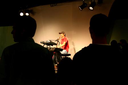 Parents and students enjoy the musical stylings of Union students such as Cody Curtis, senior music theory major, during open mic night.  This was one of many activities that was available during Family Weekend. - Photo by Kristi McMurry Woody