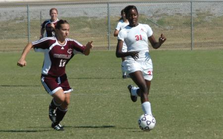 Sophomore Eboni Murphy (31) tracks down a loose ball. - Photo by Steven Aldridge