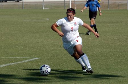 Midfielder Bridget Roney controls the ball just outside the opponent's box. - Photo by Steven Aldridge