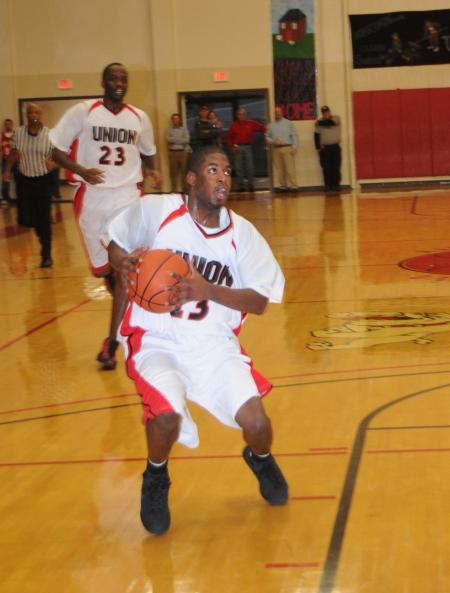 Bulldog junior Martez Hawkins drives to the basket. - Photo by Morris Abernathy