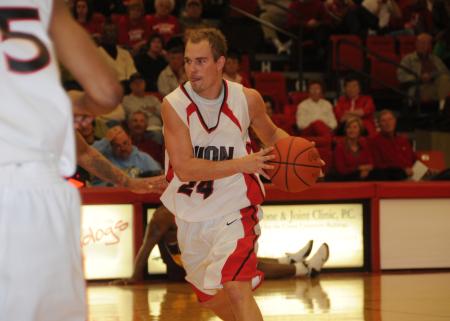 Union's Matt Neaville brings the ball down the floor in the Bulldog's Homecoming win over Robert Morris (Ill.) College. - Photo by Morris Abernathy