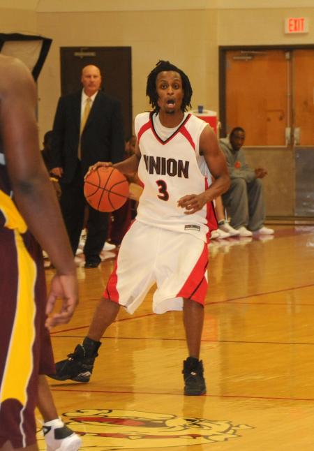 Junior guard Tacuma Alexander calls a play during Union's Homecoming win over Robert Morris (Ill.) College. - Photo by Morris Abernathy