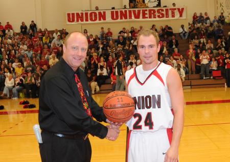 Senior Matt Neaville is recognized during Homecoming 2008, for setting Union records for three pointers in a game (11) and three pointers in a season (153) during the 2007-08 season. - Photo by Morris Abernathy