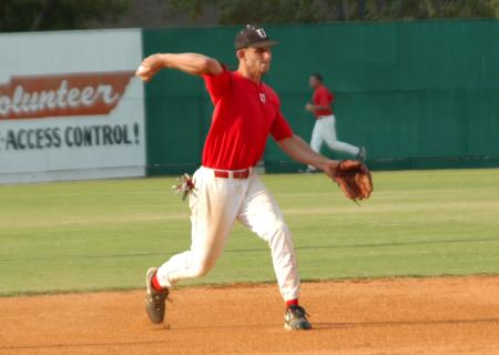 Junior transfer David Maristany makes a throw to first base during practice. - Photo by Steven Aldridge