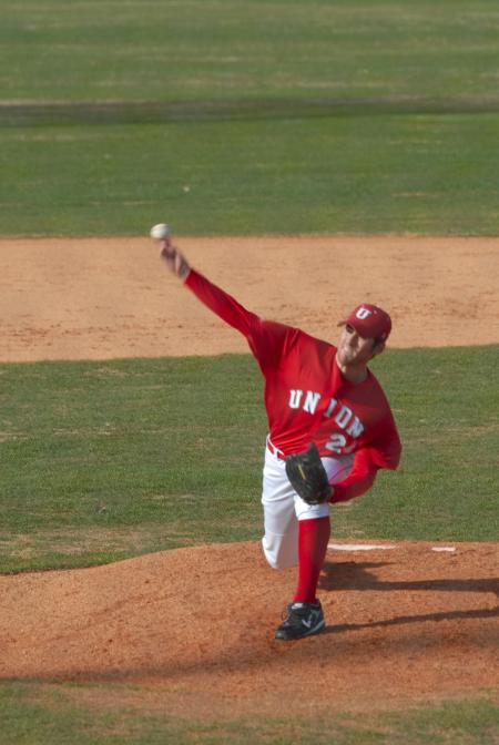 Ben Ayris delivers a pitch to home plate. - Photo by Morris Abernathy