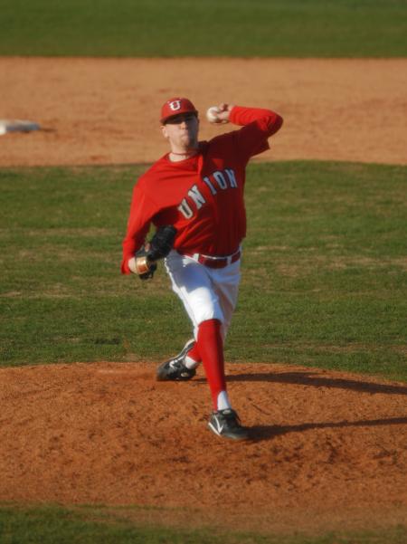 Josh Holman delivers a pitch to the plate. - Photo by Morris Abernathy