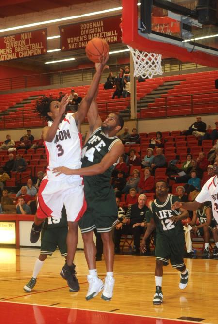 Junior Tacuma Alexander makes a lay up in the Bulldog's victory over Life (Ga.) University. - Photo by Morris Abernathy