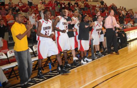 The Union bench reacts to a play on the court. - Photo by Morris Abernathy