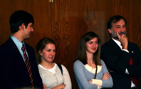 Mary Ann Poe's family waits to hear the announcement that she is the Altrusa Woman of the Year. - Photo by Kristi McMurry Woody