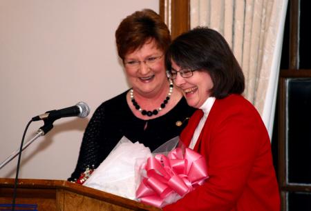 Mary Ann Poe, social work chair, reacts to the news that she was named Altrusa International Club's Woman of the Year. - Photo by Kristi McMurry Woody