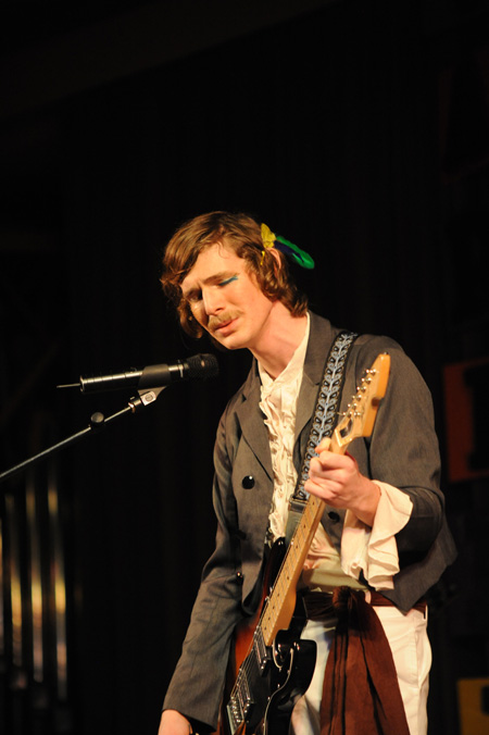 Andrew Norman, junior philosophy major, performs with his band members during the SAC Variety Show. - Photo by Morris Abernathy