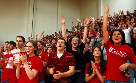 Fans cheer as the Union bulldogs win the TranSouth Conference Tournament Finals against Freed-Hardeman. - Photo by Kristi McMurry Woody