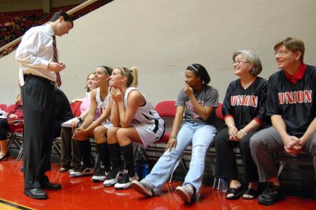 Coach Campbell shares some encouraging words with the players during the semifinals of the 2009 NAIA tournament. - Photo by Kristi McMurry Woody