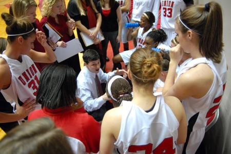 Coach Campbell talks to his team during a timeout at the championship game of the 2009 NAIA championship. - Photo by Kristi McMurry Woody