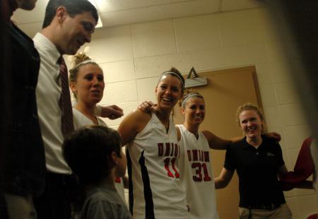 Coach Campbell and the Lady Bulldogs celebrate their first round victory in the NAIA Tournament. - Photo by Beth Spain