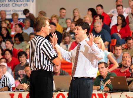 Coach Mark Campbell and the ref work through some issues during the NAIA national championship game. - Photo by Morris Abernathy