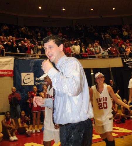 Coach Campbell recovers from his celebratory shower after the Lady Bulldog's win in the NAIA national championship. - Photo by Morris Abernathy