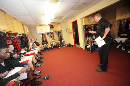 The Bulldogs listen to intruction during halftime of their TranSouth Conference Tournament championship win over Freed-Hardeman (Tenn.) University. - Photo by Morris Abernathy