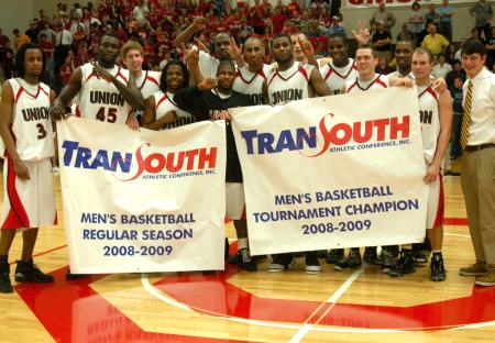 The Union Bulldogs are presented their championship banners for winning the 2009 TranSouth regular season and tournament titles. - Photo by Morris Abernathy