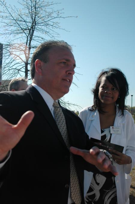 Union Trustee Kevin Shrum greets Ashley Turner and other Pharmacy students after the groundbreaking for the new academic building for the School of Pharmacy. - Photo by Beth Spain
